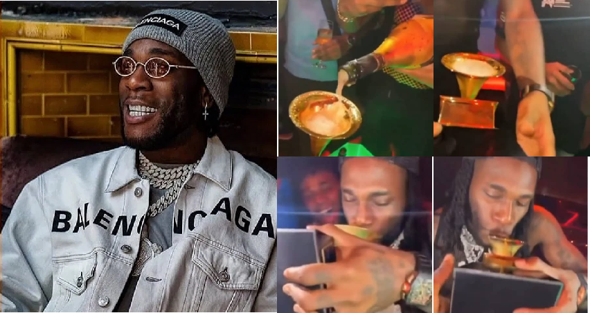 Burna Boy Spotted Drinking Champagne With His Grammy Plaque In Club(Video)
