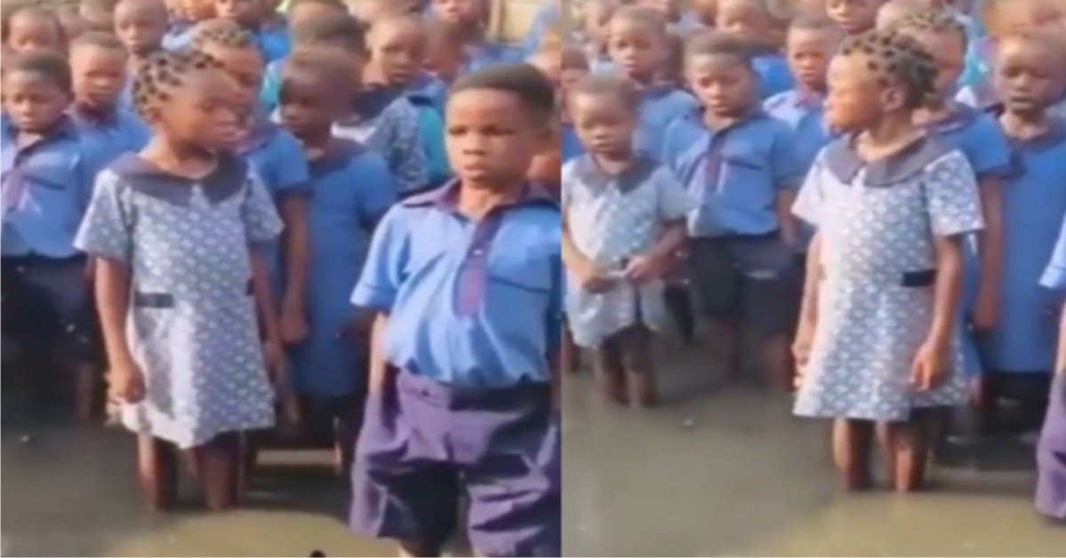 VIDEO: Lagos State Govt Reacts To Viral Video Of Students Reciting National Anthem In Flooded School Assembly Ground