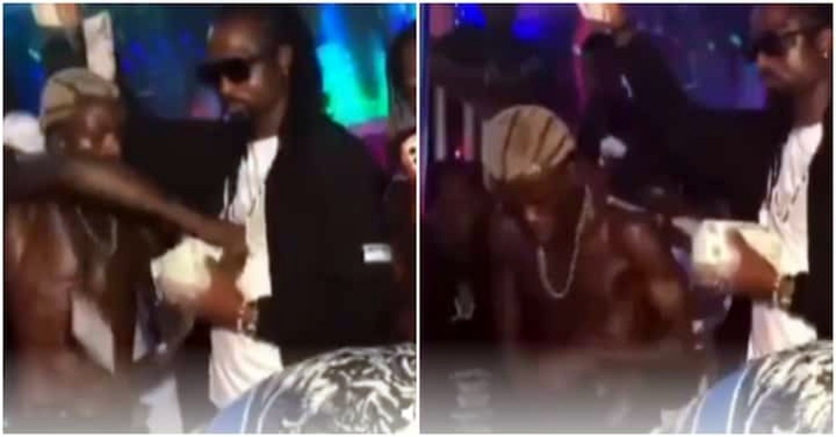 Nigerians react as Portable snatches money from man spraying him slowly in club