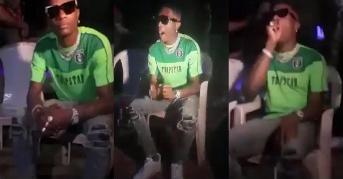 "Hungry self dy catch am" - Reactions As Old Video Of Wizkid Sitting On A Plastic Chairs At An Event In Ilorin Hits The Net (Watch)