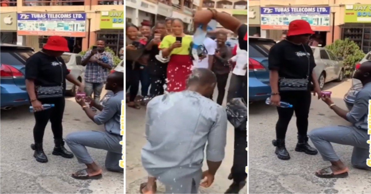"Na u go date agbero" - Reactions As Angry Lady Pours Water On Boyfriend For Proposing To Her In Public(Watch)