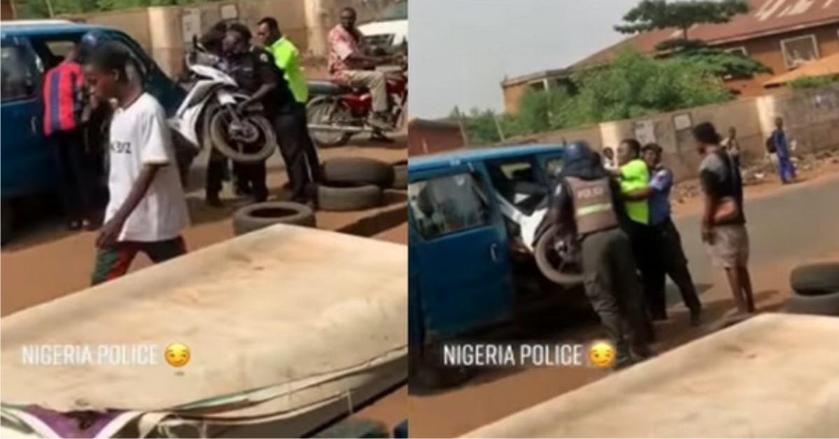 ”Sense no just dey their head” – Nigerians Reacts To Video Of Police Trying To Squeeze A Power Bike Into Small Bus (Video)