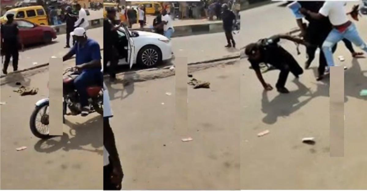 Moment Man Wrestles Police Officers Who Insisted On Extorting Him Despite Having His Complete Car Papers (Watch)