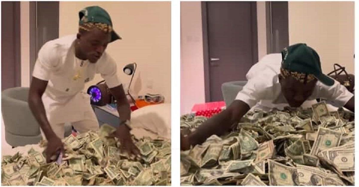 Zazu Don Cash Out Again: Shows Off Wads of Foreign Currency That Takes an Entire Bed Space