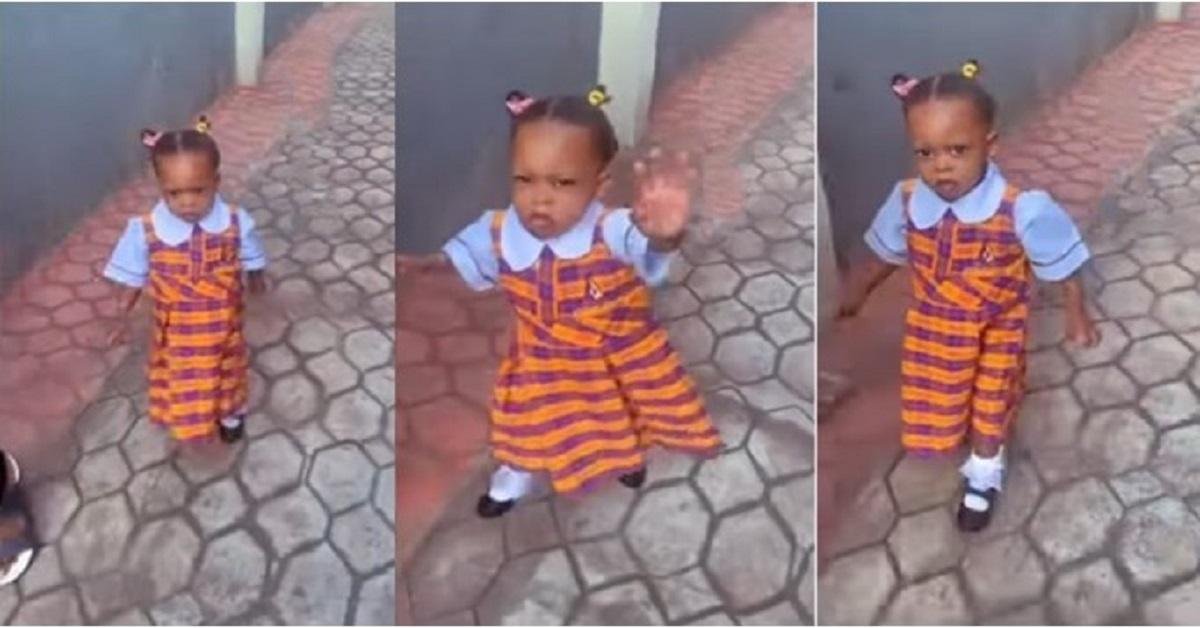 Video: Little girl gestures at her mum to stop recording her as she goes to school