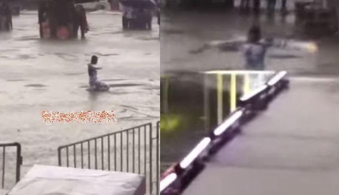 Young Girl Prays Under Heavy Rainfall Until it Stopped (Watch)