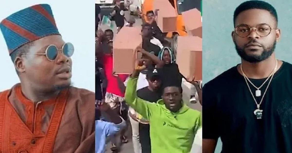 Falz, Mr Macaroni join youths as they march with coffins to mark second #LekkiShooting anniversary (Video)