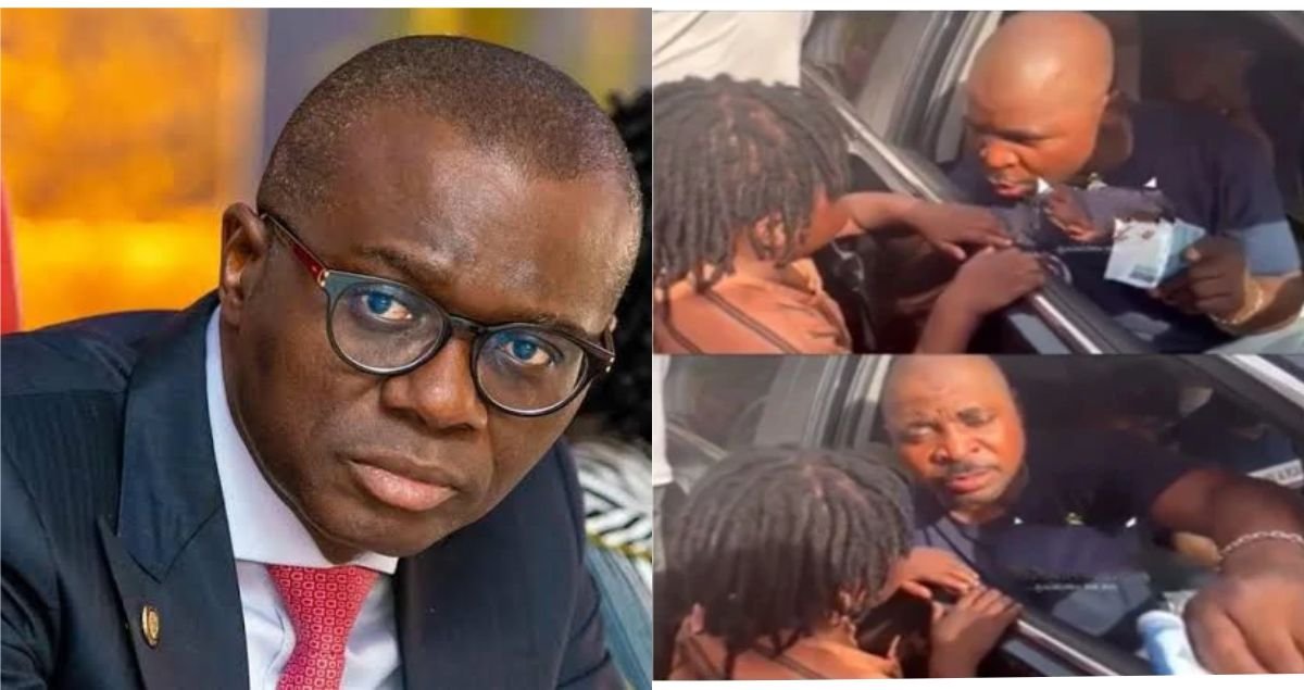 MC Oluomo captured on video sharing money to the poor in celebration of Sanwo-Olu’s victory (Watch video)